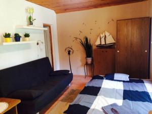 Posteľ alebo postele v izbe v ubytovaní Pitypang Apartman Kápolnásnyék