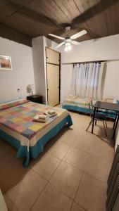 En eller flere senge i et værelse på Hotel Correa Playa