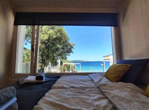 Posteľ alebo postele v izbe v ubytovaní Eco Resort Buqez villa 34