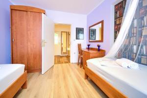 Postel nebo postele na pokoji v ubytování Apartman BOR Krk