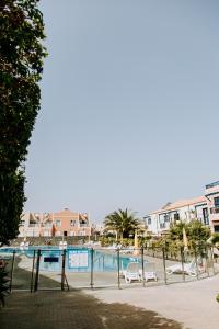 Fotografia z galérie ubytovania Acogedor adosado con piscina v destinácii Palm-mar