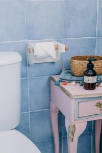 Kúpeľňa v ubytovaní Acogedor adosado con piscina