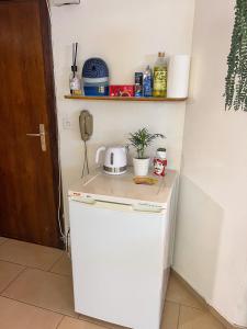 Kuchyň nebo kuchyňský kout v ubytování Monolocale a Campione d’Italia