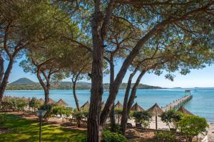 a view of the beach from the resort at Hôtel & Lodges Moby Dick in Porto-Vecchio