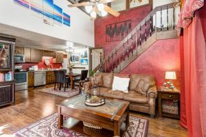 a living room with a couch and a table at Red Pine Q8 in Park City