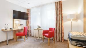 TV a/nebo společenská místnost v ubytování Hotel Kreuzer