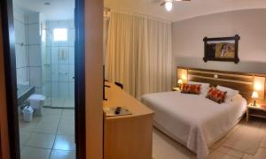 Cama ou camas em um quarto em Cambará Eco Hotel