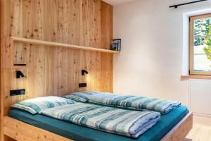 Postel nebo postele na pokoji v ubytování Hof im Thal Apt Linde
