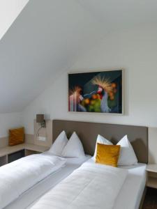 Postel nebo postele na pokoji v ubytování Hotel Lokomotive