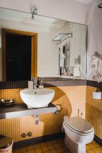 Koupelna v ubytování Domus Cavour Guest house + 47 fotografií