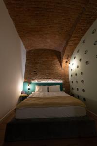 Ένα ή περισσότερα κρεβάτια σε δωμάτιο στο Apollo Brașovul Istoric