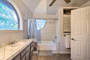 a bathroom with a sink and a tub and a window at Deck + Grill: Mtn Haven in Stanislaus Nat'l Forest in Arnold +32 photos
