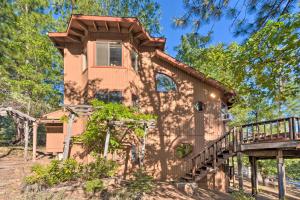 a house with a staircase leading up to it at Deck + Grill: Mtn Haven in Stanislaus Nat'l Forest in Arnold