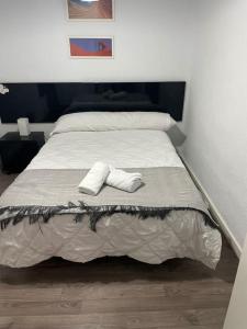 Кровать или кровати в номере Precioso ático con terraza en centro de Alicante