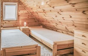 Posteľ alebo postele v izbe v ubytovaní Nice Home In Wegorzewo With Sauna
