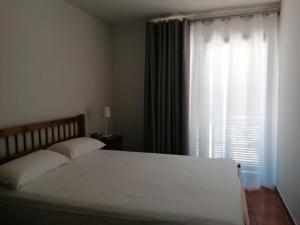 Posteľ alebo postele v izbe v ubytovaní Casa en Les Oliveres ideal para familias con niños