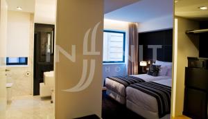 Postel nebo postele na pokoji v ubytování Hotel Inffinit