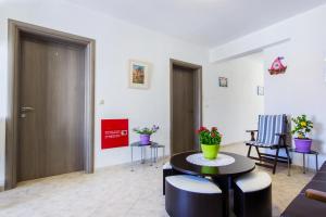 A seating area at RG Studios Thassos #5
