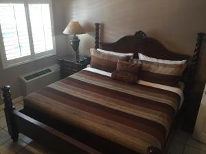 Кровать или кровати в номере Coral Reef Guesthouse