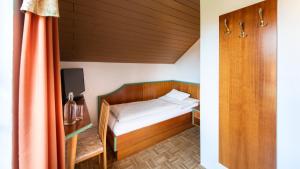 Postel nebo postele na pokoji v ubytování Hotel Altneudörflerhof
