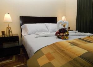 Ένα ή περισσότερα κρεβάτια σε δωμάτιο στο Hostal Samichay