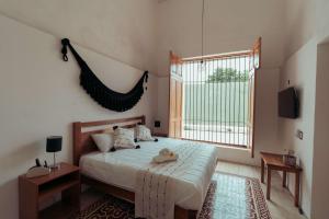 Postel nebo postele na pokoji v ubytování Hotel Casa Piedad + 37 fotografií