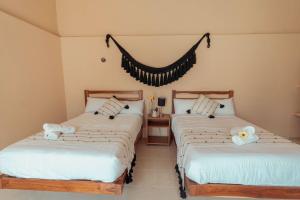 Postel nebo postele na pokoji v ubytování Hotel Casa Piedad