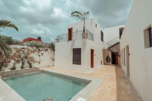 Bazén v ubytování Hotel Casa Piedad nebo v jeho okolí