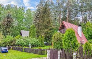 Vonkajšia záhrada v ubytovaní Holiday Home Barczewo Kaplityny Vii