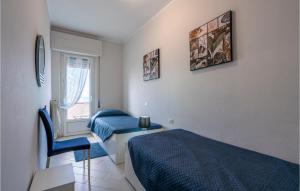 Katil atau katil-katil dalam bilik di 2 Bedroom Amazing Apartment In Marinella Di Sarzana