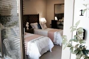 Voodi või voodid majutusasutuse Mi Vida Guesthouse toas