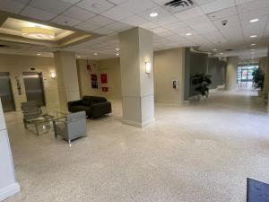 a lobby of a hospital with a couch and chairs at Ocean view Hollywood in Hollywood +24 photos