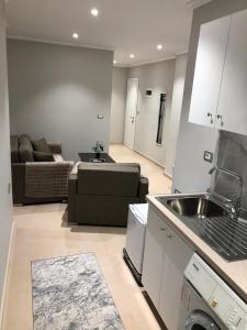Kuchyň nebo kuchyňský kout v ubytování Cozy GuestHome Korce