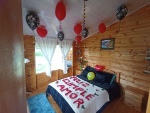 Postel nebo postele na pokoji v ubytování Cabaña La Granja tomine