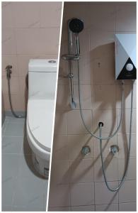 La salle de bains est pourvue de toilettes et d'un pommeau de douche. dans l'établissement Ban Nam Mao Resort, à Na Jomtien