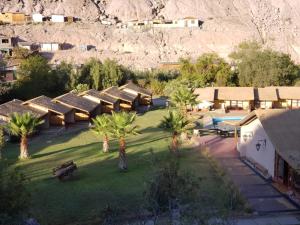 an aerial view of a resort with palm trees at Aruma Codpa in Codpa