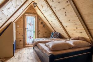 Postel nebo postele na pokoji v ubytování Drvene kuće ŠUŠKA - Wooden Houses SUSKA