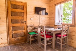 TV a/nebo společenská místnost v ubytování Drvene kuće ŠUŠKA - Wooden Houses SUSKA