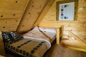 Postel nebo postele na pokoji v ubytování Drvene kuće ŠUŠKA - Wooden Houses SUSKA