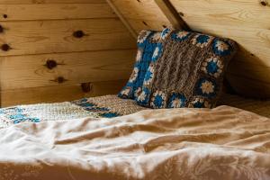 Postel nebo postele na pokoji v ubytování Drvene kuće ŠUŠKA - Wooden Houses SUSKA
