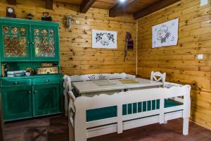 Postel nebo postele na pokoji v ubytování Drvene kuće ŠUŠKA - Wooden Houses SUSKA