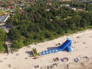 an aerial view of a playground on a beach at Cosy apartment for 2 persons right by the sea, Ustronie Morskie in Ustronie Morskie