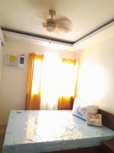Postel nebo postele na pokoji v ubytování Stanford Suites 2 Lilian
