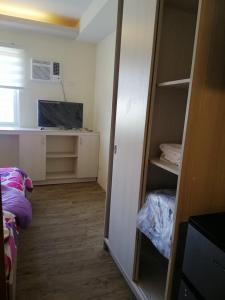 TV a/nebo společenská místnost v ubytování Stanford Suites 2 Lilian