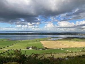 an aerial view of a large body of water at The Burren Snug in Galway +14 photos
