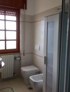 Ванная комната в Appartamento Serenella