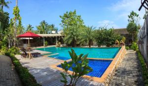 a pool at a villa with a resort at Sasitara Residence in Chaweng