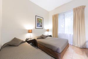 Postel nebo postele na pokoji v ubytování Forrest Hotel & Apartments + 143 fotografií