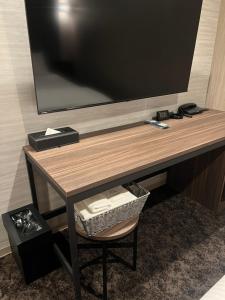 TV a/nebo společenská místnost v ubytování HOTEL GrayⅡ