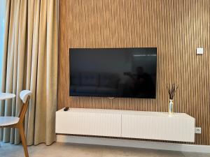 TV a/nebo společenská místnost v ubytování Apartament na Gdańskiej